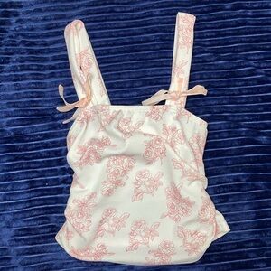 A tank top shirt
Size M